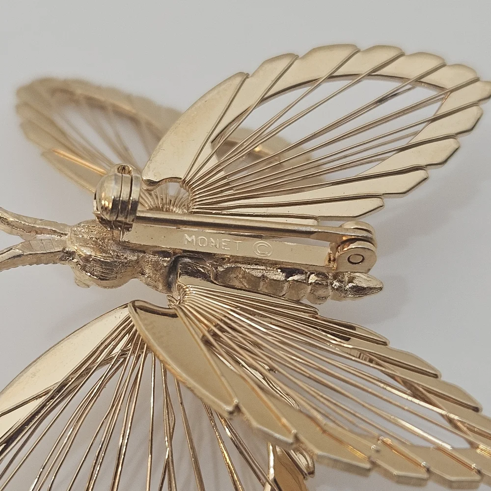 Vintage Monet gold tone butterfly brooch signed